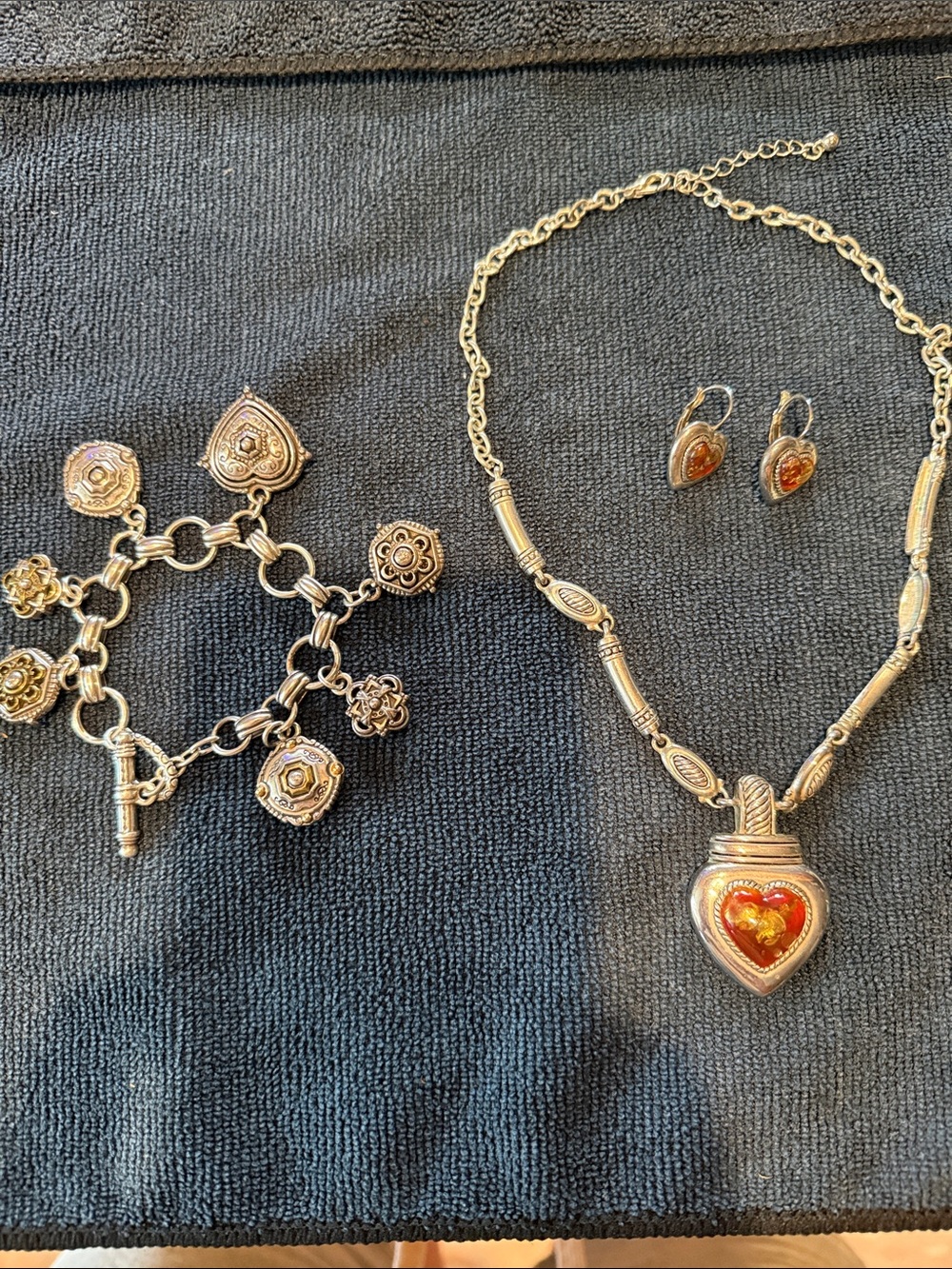 Heard shaped necklace and matching earrings, bracelet, Briton .